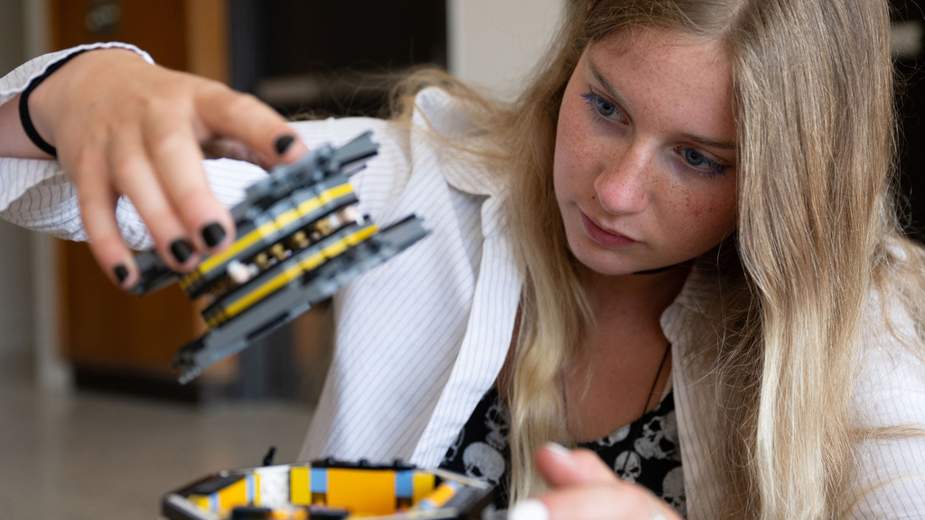 Ava Reed with TRACERS LEGO model